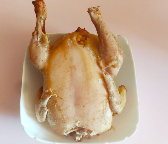 Курица, фаршированная овощами, в духовке